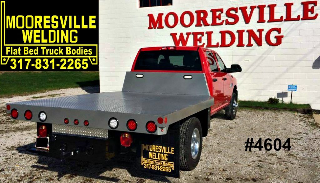 Image of Flatbed Truck Body Gooseneck Hauler Special Body 94"x9' with the following optional features:<br /> Custom Bulkhead with LED Work Lights, Box Opening with Hinged Lid, Custom Paint, LED lights in rear apron, Heavy Duty Receiver Hitch, Mud flaps in front of rear axle, Heavy Duty Gooseneck Hitch, 7-way RV Electric Trailer Plug, Aluminum Under Body Box, Aluminum Frame End Cover Plate, Angled Front Corners Image of Flatbed Truck Body Gooseneck Hauler Special Body 94"x9' with the following optional features:<br /> Custom Bulkhead with LED Work Lights, Box Opening with Hinged Lid, Custom Paint, LED lights in rear apron, Heavy Duty Receiver Hitch, Mud flaps in front of rear axle, Heavy Duty Gooseneck Hitch, 7-way RV Electric Trailer Plug, Aluminum Under Body Box, Aluminum Frame End Cover Plate, Angled Front Corners